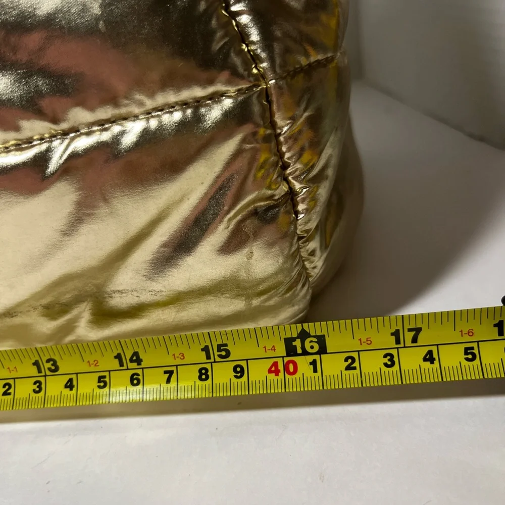 Justice Gold, metallic duffel bag